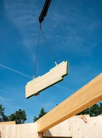 Wood panel being moved in mid-air